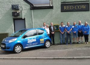Ferriers Managing Director Mr Brian Thomas along side Chris Morgan, Huw Irranca Davies MP and a few of the Maesteg Park F.C management team at the unveiling of the de-fibrulator at the Red Cow public house.